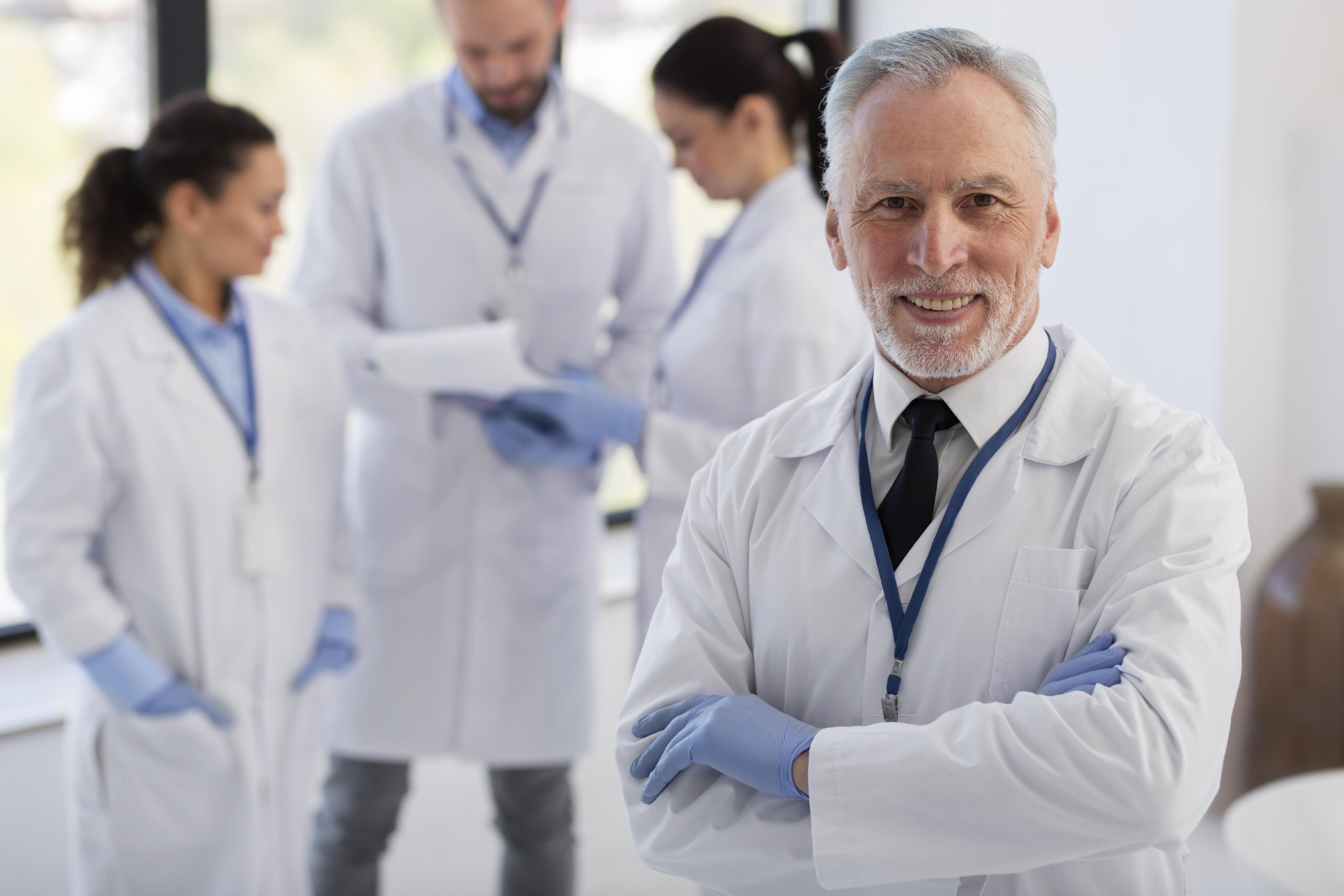 Medium Shot Scientists With Lab Coats